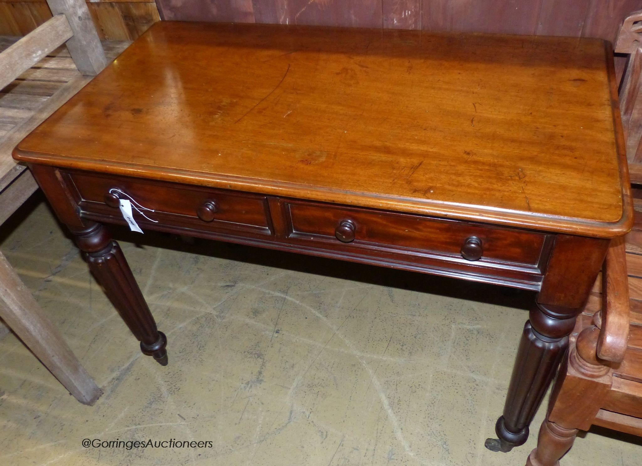 A Victorian mahogany two drawer side table, stamped Wilkinson 7514, width 99cm, depth 54cm, height 74cm